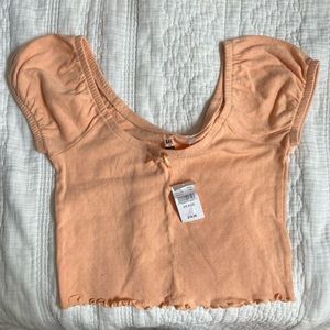 Off the shoulder orange shirt